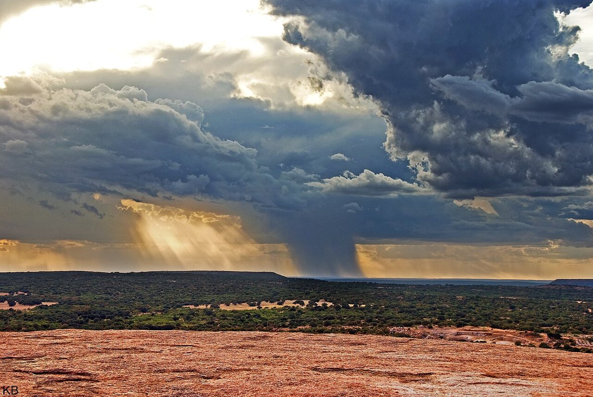 the view from the granite summit of Enchanted Rock across the Hill Country