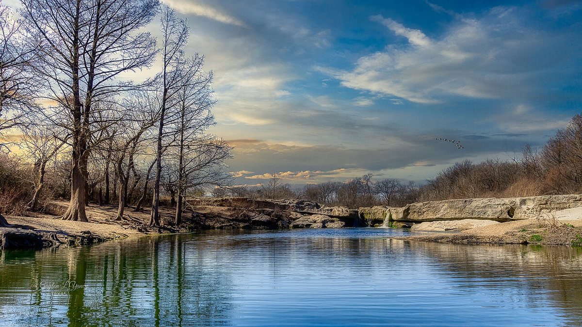 Limestone waterfalls and pool at McKinney Falls State Park on the outskirts of Austin