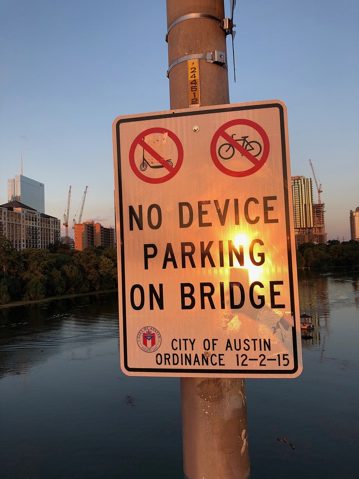 crowds watching bats emerge at dusk from the Congress Avenue Bridge